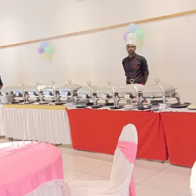 A full buffet setup for a birthday party at Prestige Ferns Residency, complete with live counters. Our team is ready to serve, ensuring a smooth and enjoyable event for everyone.