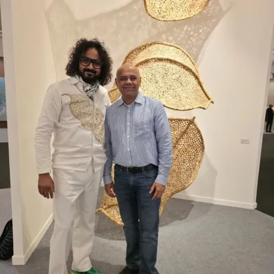 In conversation with a visitor at the India Art Fair in front of my 'Biography' installation. These interactions are invaluable, as they allow me to share the story of the work directly and hear people's personal responses.