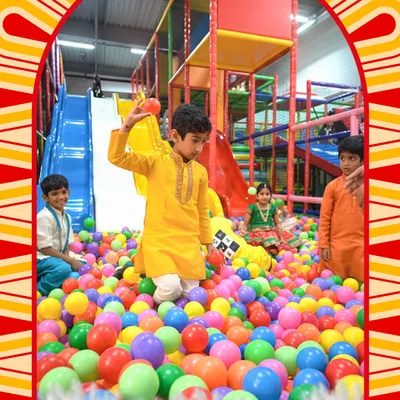 Celebrating Durga Puja with festive spirits in our ball pit. It's wonderful to see kids enjoying the holidays in their traditional attire.