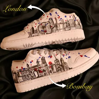 A tale of two cities. I hand-painted the skylines of London and Bombay on this pair of Nike Air Jordan 1 lows, with splashes of red and blue to add a vibrant, artistic touch.
