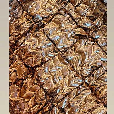 My ultra-fudgy Nutella swirl brownies. You can see the beautiful, crackly top and the rich Nutella swirled into the batter.