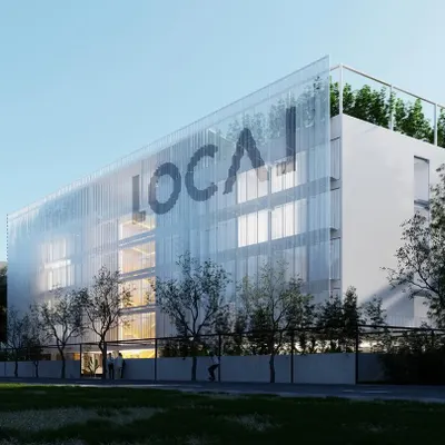 For this co-living project, we used a large, perforated mesh screen to wrap the facade. This allows for ample natural light while obscuring visual clutter like air conditioning units, maintaining a coherent and clean aesthetic.