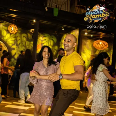 The pure joy of social dancing captured at our 'Mucho Mambo' event. Our goal is to get you comfortable and confident enough to hit the dance floor and create fun moments like this one.