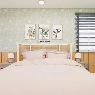 The centerpiece of this master bedroom is the distressed cane headboard, chosen to add depth and character. The client loved her garden, so I used a soft, botanical wallpaper and nature-inspired art to reflect her personality in the decor.