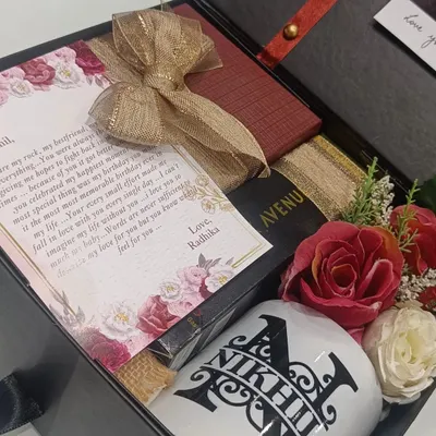 A perfect 'first salary' gift for a boyfriend. This hamper includes a personalized mug and diary, a heartfelt letter, and a box of his favorite accessories.