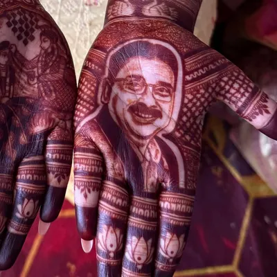 The beautiful, dark stain of the 'Papa meri jaan' portrait, achieved with my homemade, 100% natural henna paste. This shows the final color you can expect a few days after application.