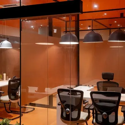 This office's south zone features energizing orange hues, a choice made in collaboration with the design team to boost productivity. As a Vastu consultant, I guide the use of color theory to align with the space's energy and the company's goals.