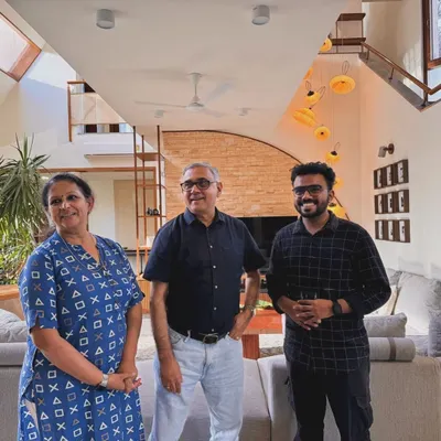 A proud moment as we hand over a newly completed home to our clients in Bengaluru. Seeing their joy makes the entire process worthwhile. We are pictured here with our clients and our project architect.