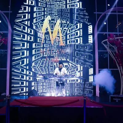 My VDJ setup in full effect. I perform on a massive stage with custom-synced visuals, turning the entire venue into an immersive audio-visual spectacle.