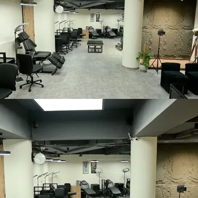 A wide view of my tattoo studio floor. Each station is fully equipped and spaced out to provide a private and professional environment for every client.