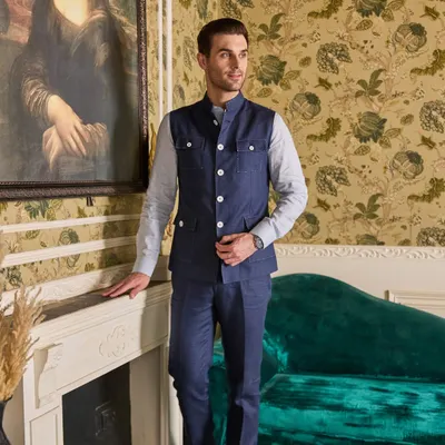 Presenting my Hunter Style Waistcoat in midnight blue. This piece blends rugged charm with timeless sophistication, featuring four pockets and a structured fit. Paired with a comfy linen shirt, it's the perfect attire for a summer evening.