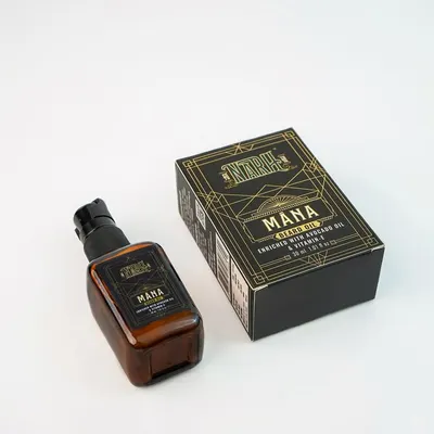 A classic e-commerce shot for a men's grooming brand, featuring the product and its packaging. The clean, white background ensures the focus is entirely on the product.