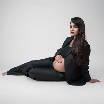Empowered, fearless, and expecting! This stunning solo maternity shot showcases the perfect blend of elegance and confidence.
