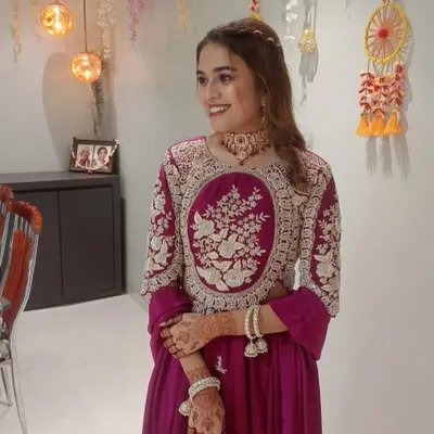 A happy client looking lovely for a festive occasion. She paired her embroidered outfit with a custom choker and matching bracelets from my collection.