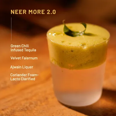 Neer More 2.0, but make it wild. This fiery twist on a South Indian classic features green chili-infused tequila, ajwain liqueur, and a coriander foam.