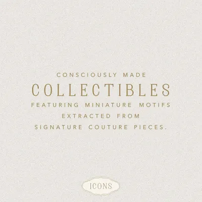 Our 'Icons' collection is where couture vision is reimagined for everyday wear. This image introduces our philosophy of creating consciously made collectibles from signature designer motifs.
