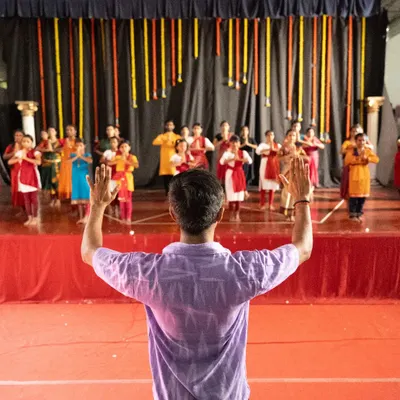 A view from the stage during rehearsals with my students. Guiding the next generation of dancers is one of the most rewarding parts of my work.