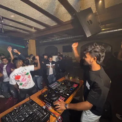 From dusk till dawn, the party never stops. Here I am, hyping up the crowd at a packed club in Bangalore.
