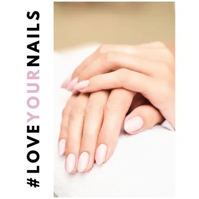 A simple, clean manicure featuring a soft, matte pink polish on natural nails. This style is all about understated elegance and is perfect for a professional and polished look.