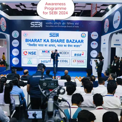On stage for a "Bharat Ka Share Bazaar" awareness program for SEBI. The goal is to educate the public about the stock market and protect them from cyber fraud, and we do it with a dose of humor that keeps everyone engaged.