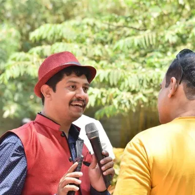 A candid moment of interaction with a guest. I believe in making personal connections to ensure everyone feels welcome and engaged throughout the event.