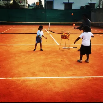 Young beginners practice hand-eye coordination, a core skill for starting tennis. These fun drills are designed to make learning the basics engaging and effective.