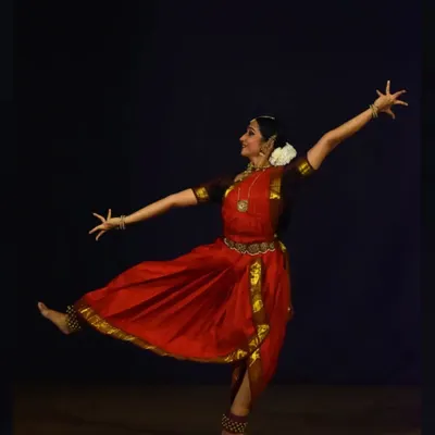 A classic Bharatanatyam pose from a solo recital in Pune. This posture, with its clean lines and expansive energy, is a fundamental element of the nritta or pure dance aspect of my performances.