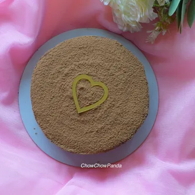 Sometimes, all you want is a simple cake without a lot of frosting. This is a classic chocolate cake, lightly dusted with cocoa powder and decorated with a single heart.