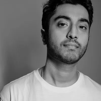 A simple black and white headshot. This is me, the guy behind the grillz and the music.