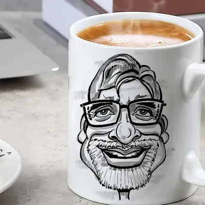 Here is an example of a finished caricature printed on a white coffee mug. This service transforms a hand-drawn portrait into a functional and unique item that can be used and enjoyed every day.
