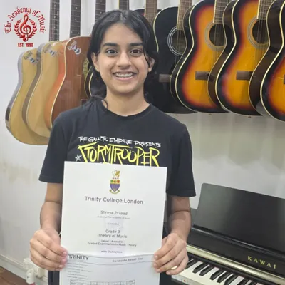 Bravo to Shreya Prasad. We are absolutely thrilled to announce her stellar achievement of 94/100 in the Grade 3 Theory of Music exam, conducted by the renowned Trinity College of Music London.