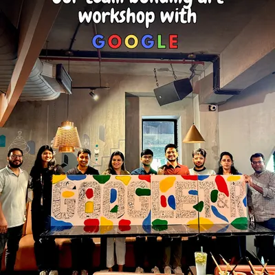 Here's the proud team from Google with their finished collaborative doodle art. It was amazing to see them fill the canvas with inside jokes, team memories, and colorful designs, creating a piece that is uniquely theirs.