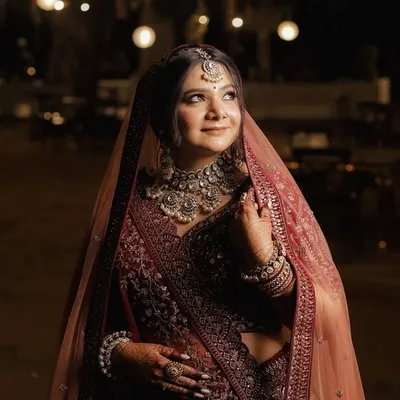A classic bridal portrait that captures the essence of my work. The focus is on creating a radiant complexion with soft, defined eyes and a balanced lip, ensuring the bride looks and feels like the best version of herself.