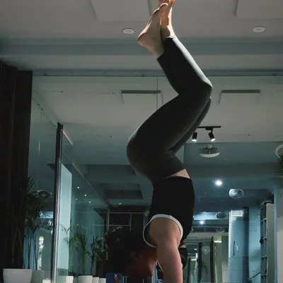 Finding my headspace with a tucked forearm stand (Pincha Mayurasana). This inversion requires significant shoulder and core strength, and is a great way to build focus.