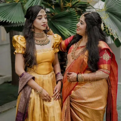 It's always a pleasure to do makeup for the bride and her family. Here, the bride and her mother share a special moment, both looking radiant for the wedding festivities.