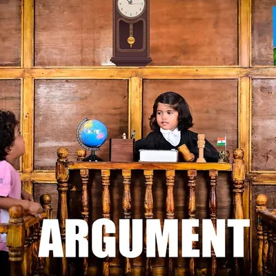 The arguments have begun! This playful courtroom-themed photo captures the fun and drama of childhood imagination, turning a creative idea into a hilarious and memorable portrait.
