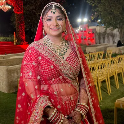 The complete royal look for this stunning bride in her red lehenga. Her happiness and confidence shine through, which is always my ultimate goal.