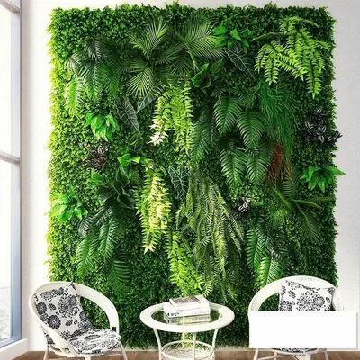 This artificial green wall creates a stunning, maintenance-free feature in a living room. The design uses a mix of ferns and hanging plants for a realistic, multi-layered look.