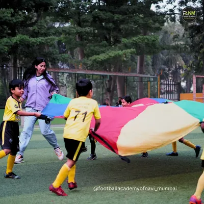 Teamwork makes the dream work, especially during our fun parachute games. These activities are perfect for teaching our younger players about cooperation in a playful way.
