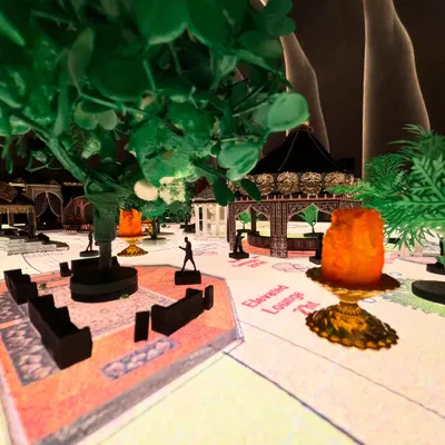 This is a miniature model I created for an 'Arabian Nights' theme. This first step is crucial for visualizing every detail, from the layout of the lounges to the placement of trees and props, ensuring the final design is perfect.