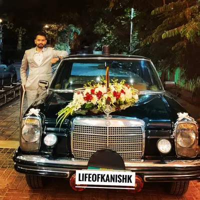 Posing with a classic car. This image represents an appreciation the timeless quality and the success that comes from dedication and hard work, values I apply to my legal career.