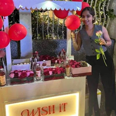 For a Valentine's Day event, we decorated our gifting kiosk with festive red balloons and stocked it with roses and romantic treats. This shows how easily the station can be customized to fit the theme and mood of your special occasion, whether it's a birthday, shower, or holiday party.