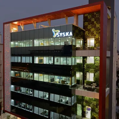 Our design for the Syska corporate headquarters in Pune features a prominent multi-story vertical garden on its facade. This was a pioneering use of biophilia in corporate architecture, creating a living, breathing building.