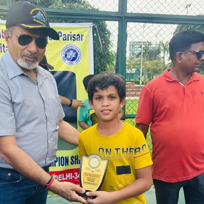 Celebrating Garvit Gupta, who secured the second position in the Under-8 category at the DDA Tennis Tournament 2024. Here he is receiving his well-deserved award.