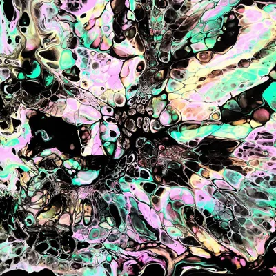 A close-up of the incredible 'cell' patterns that can be achieved with acrylic pouring. This effect is created by a reaction between the paints and a silicone additive.