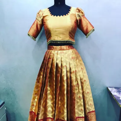 This entire lehenga and blouse set was stitched from a single silk saree. I used the body of the saree for the pleated skirt and the pallu for the puff-sleeve blouse.
