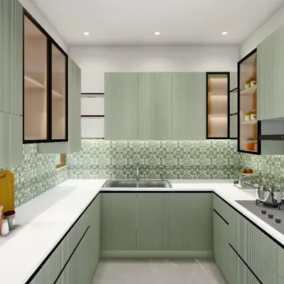 This U-shaped kitchen layout maximizes counter space and storage, making it highly functional for avid cooks. The sea-green fluted cabinets are paired with a patterned backsplash and under-cabinet lighting for a bright and efficient workspace.