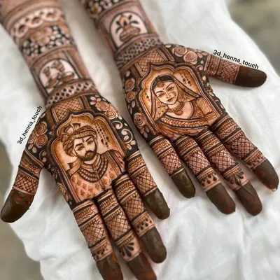 A finished bridal mehndi set with detailed portraits of the bride and groom. Learning this skill will allow you to offer highly personalized and premium services to your clients.