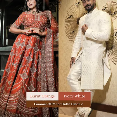 A perfect match in burnt orange and ivory white. This couple look showcases how complementary colors can create a timeless and coordinated statement for any festive occasion.