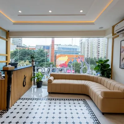 A look at our bright and modern Yelahanka clinic reception. We've created a welcoming space with a comfortable lounge area, ensuring your wellness journey begins the moment you step inside.
